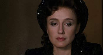 Movie still from “Life Is Beautiful” (1997), directed by Roberto Benigni – A person wearing a hat; Close Up shot, Over the shoulder angle