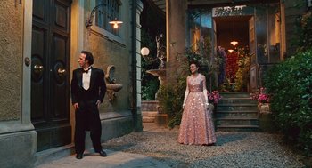 Movie still from “Life Is Beautiful” (1997), directed by Roberto Benigni – A man and a woman dressed in formal wear; Wide shot, Low angle
