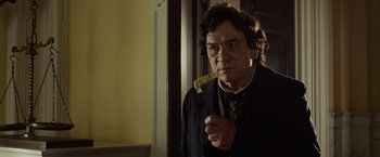 Movie still from “Lincoln” (2012), directed by Steven Spielberg – A man holding a banana in his hand; Close Up shot, Low angle