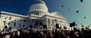 Movie still from “Lincoln” (2012), directed by Steven Spielberg – A crowd of people standing in front of a white building; Extreme Wide shot, Low angle