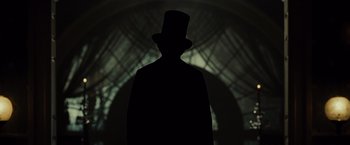 Movie still from “Lincoln” (2012), directed by Steven Spielberg – A man wearing a top hat and a black coat; Close Up shot, Low angle