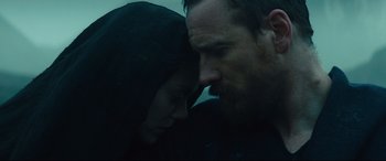 Movie still from “Macbeth” (2015), directed by Justin Kurzel – A man and a woman face to face in the dark; Close Up shot, Low angle