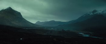 Movie still from “Macbeth” (2015), directed by Justin Kurzel – A view of a mountain range in the distance; Extreme Wide shot, Low angle