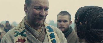 Movie still from “Macbeth” (2015), directed by Justin Kurzel – A man with a towel around his neck and a man with a towel around his neck; Close Up shot, Over the shoulder angle