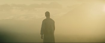 Movie still from “Macbeth” (2015), directed by Justin Kurzel – A man standing in the middle of a foggy field; Extreme Wide shot, Low angle