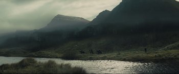 Movie still from “Macbeth” (2015), directed by Justin Kurzel – A group of horses running through a field; Extreme Wide shot, Low angle
