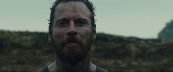 Movie still from “Macbeth” (2015), directed by Justin Kurzel – A person with dirt on his face; Close Up shot, Low angle