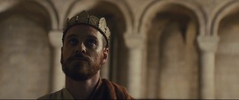 Movie still from “Macbeth” (2015), directed by Justin Kurzel – A person wearing a crown; Close Up shot, Low angle