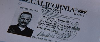Movie still from “Memento” (2000), directed by Christopher Nolan – A california driver's license; Extreme Close Up shot, Overhead angle