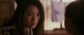 Movie still from “Memoirs of a Geisha” (2005), directed by Rob Marshall – Close Up shot, Over the shoulder angle