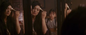 Movie still from “Memoirs of a Geisha” (2005), directed by Rob Marshall – Close Up shot, Over the shoulder angle