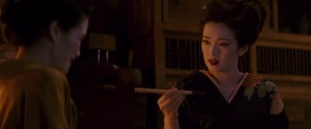 Movie still from “Memoirs of a Geisha” (2005), directed by Rob Marshall – Close Up shot, Over the shoulder angle