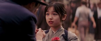 Movie still from “Memoirs of a Geisha” (2005), directed by Rob Marshall – Close Up shot, Over the shoulder angle