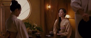 Movie still from “Memoirs of a Geisha” (2005), directed by Rob Marshall – Medium shot, Over the shoulder angle