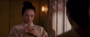Movie still from “Memoirs of a Geisha” (2005), directed by Rob Marshall – Close Up shot, Over the shoulder angle