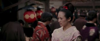 Movie still from “Memoirs of a Geisha” (2005), directed by Rob Marshall – Close Up shot, Over the shoulder angle