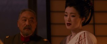 Movie still from “Memoirs of a Geisha” (2005), directed by Rob Marshall – Close Up shot, Over the shoulder angle