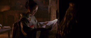Movie still from “Memoirs of a Geisha” (2005), directed by Rob Marshall – Medium shot, Low angle