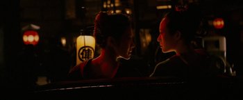 Movie still from “Memoirs of a Geisha” (2005), directed by Rob Marshall – Close Up shot, Over the shoulder angle