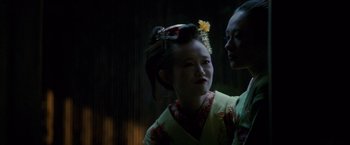 Movie still from “Memoirs of a Geisha” (2005), directed by Rob Marshall – Close Up shot, Over the shoulder angle