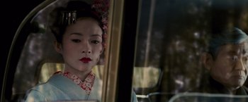 Movie still from “Memoirs of a Geisha” (2005), directed by Rob Marshall – Close Up shot, Over the shoulder angle