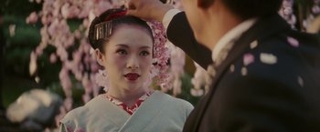 Movie still from “Memoirs of a Geisha” (2005), directed by Rob Marshall – Close Up shot, Over the shoulder angle