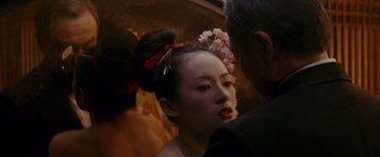 Movie still from “Memoirs of a Geisha” (2005), directed by Rob Marshall – Close Up shot, Over the shoulder angle
