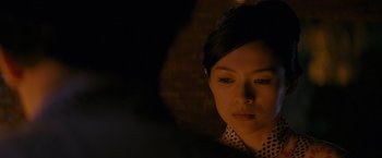 Movie still from “Memoirs of a Geisha” (2005), directed by Rob Marshall – Close Up shot, Over the shoulder angle