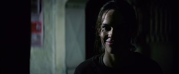 Movie still from “Million Dollar Baby” (2004), directed by Clint Eastwood – A person with wet hair; Close Up shot, Over the shoulder angle