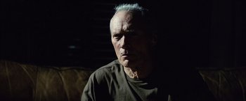 Movie still from “Million Dollar Baby” (2004), directed by Clint Eastwood – An older man is looking at the camera; Close Up shot, Low angle