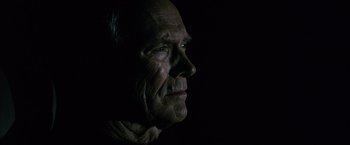 Movie still from “Million Dollar Baby” (2004), directed by Clint Eastwood – An older man is looking into the distance; Close Up shot, Low angle