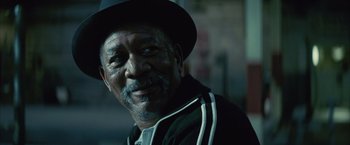 Movie still from “Million Dollar Baby” (2004), directed by Clint Eastwood – An older man wearing a black hat and a black jacket; Close Up shot, Over the shoulder angle