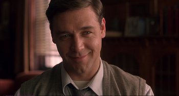 Movie still from “A Beautiful Mind” (2001), directed by Ron Howard – A person wearing a suit and tie; Close Up shot, Low angle