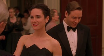 Movie still from “A Beautiful Mind” (2001), directed by Ron Howard – A man and a woman in a black dress; Close Up shot, Low angle