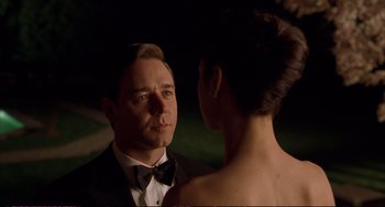 Movie still from “A Beautiful Mind” (2001), directed by Ron Howard – A man and a woman are looking at one another; Close Up shot, Over the shoulder angle