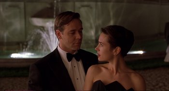 Movie still from “A Beautiful Mind” (2001), directed by Ron Howard – A man and a woman dressed in formal wear; Close Up shot, Low angle