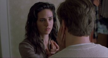 Movie still from “A Beautiful Mind” (2001), directed by Ron Howard – A woman looking at a man in the mirror; Close Up shot, Over the shoulder angle