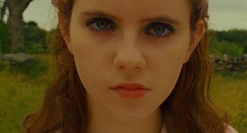 Movie still from “Moonrise Kingdom” (2012), directed by Wes Anderson – A woman's face with blue eye shadow; Close Up shot, High angle