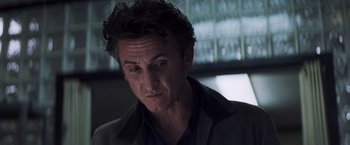Movie still from “Mystic River” (2003), directed by Clint Eastwood – A person wearing a jacket; Close Up shot, Low angle