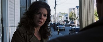 Movie still from “Mystic River” (2003), directed by Clint Eastwood – A person on the street; Close Up shot, Over the shoulder angle