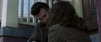 Movie still from “Mystic River” (2003), directed by Clint Eastwood – A man and a woman talking to each other; Close Up shot, Over the shoulder angle