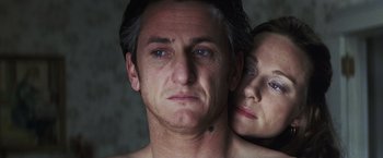 Movie still from “Mystic River” (2003), directed by Clint Eastwood – A man and a woman's face; Close Up shot, Overhead angle