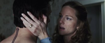 Movie still from “Mystic River” (2003), directed by Clint Eastwood – A man and a woman looking at one another; Close Up shot, Over the shoulder angle