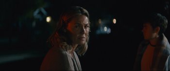 Movie still from “Nobody” (2021), directed by Ilya Naishuller – A person wearing a jacket; Close Up shot, Over the shoulder angle