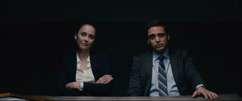 Movie still from “Nobody” (2021), directed by Ilya Naishuller – A man and a woman sitting next to each other; Medium shot, Over the shoulder angle