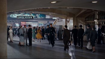 Movie still from “North by Northwest” (1959), directed by Alfred Hitchcock – A group of people walking in a hallway; Extreme Wide shot, High angle