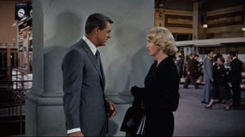 Movie still from “North by Northwest” (1959), directed by Alfred Hitchcock – A man and a woman talking to each other; Medium shot, Over the shoulder angle