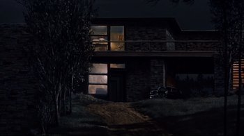 Movie still from “North by Northwest” (1959), directed by Alfred Hitchcock – A car parked in front of a house at night; Extreme Wide shot, Low angle