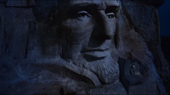 Movie still from “North by Northwest” (1959), directed by Alfred Hitchcock – The face of abraham lincoln carved into the side of a mountain; Extreme Close Up shot, Low angle