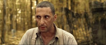Movie still from “O Brother, Where Art Thou?” (2000), directed by Joel Coen – A person wearing a shirt; Close Up shot, Low angle